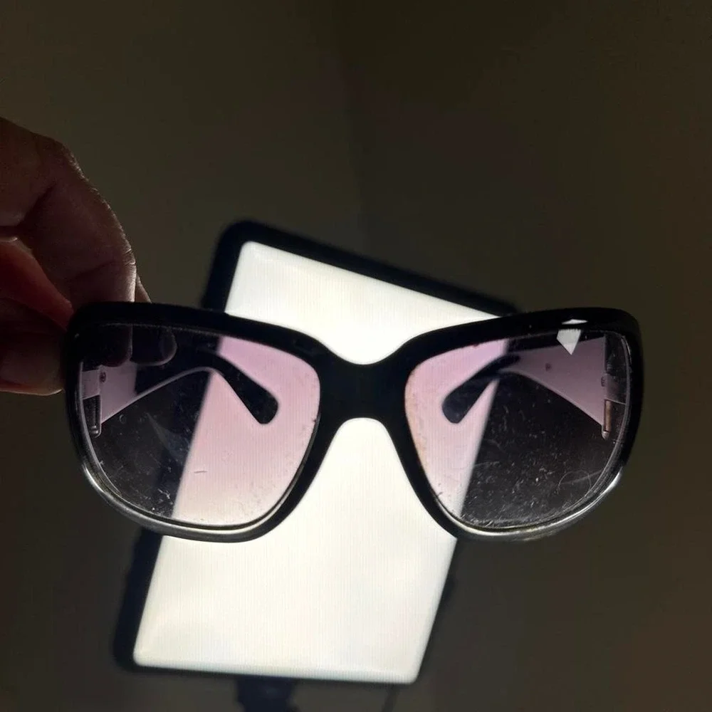 Kenneth Cole sunglasses. This is a  vintage discontinued model.